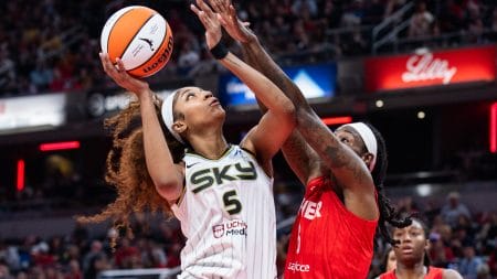 May 17, 2025; Indianapolis, Indiana, USA; Chicago Sky forward Angel Reese (5) shoots the ball while Indiana Fever forward Natasha Howard (6) defends in the second half at Gainbridge Fieldhouse.