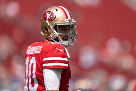 San Francisco quarterback #10 Jimmy Garoppolo warming up before a 2021 home game.