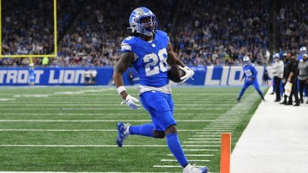 Nov 17, 2024; Detroit, Michigan, USA; Detroit Lions running back Jahmyr Gibbs (26) runs for a touchdown against the Jacksonville Jaguars in the second quarter at Ford Field.