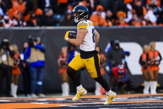 Dec 1, 2024; Cincinnati, Ohio, USA; Pittsburgh Steelers tight end Pat Freiermuth (88) runs the ball in for a touchdown against the Cincinnati Bengals in the second half at Paycor Stadium.